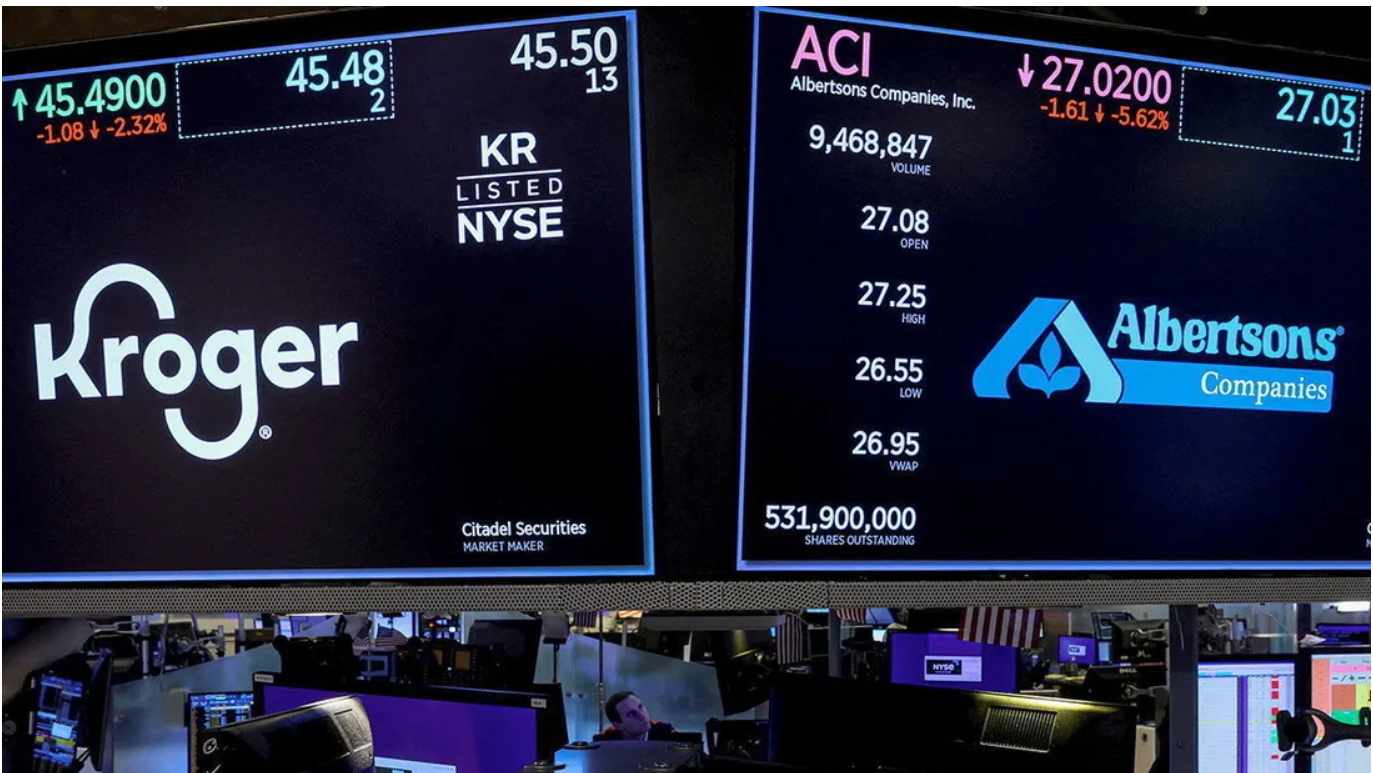 Kroger and Albertson's logos on the stock exchange