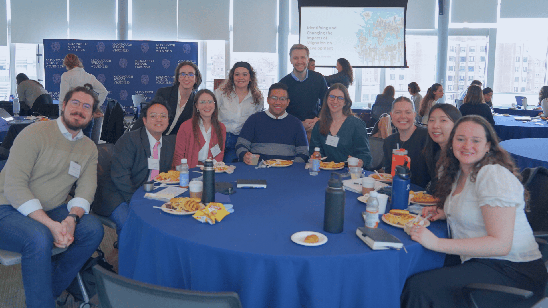 Scholars and practitioners sitting together at the 2026 Washington Area Immigration Symposium.